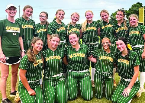 The Gatewood softball poses for a team photo after defeating Trinity Christian in the season opener last week. CONTRIBUTED