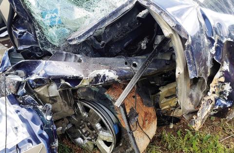A Ford F150 driven by 21-year-old Omar Palacos-Balderas shows severe damage from an early Friday morning crash into parked construction equipment alongside Hwy. 441 north of Eatonton. CONTRIBUTED