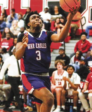 Jmari Greene (3) scored a team-high 36 points in Putnam County’s 100-94 double overtime win over Towers in the semifinal round of the region tournament. He was limited to seven points in the region title game against Greenforest. LANCE MCCURLEY/Staff