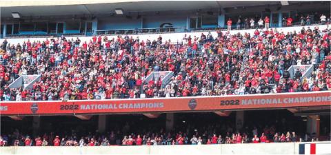 Fans in the upper deck level of Sanford Stadium cheer as the Bulldogs enter Dooley Field. LANCE MCCURLEY/Staff