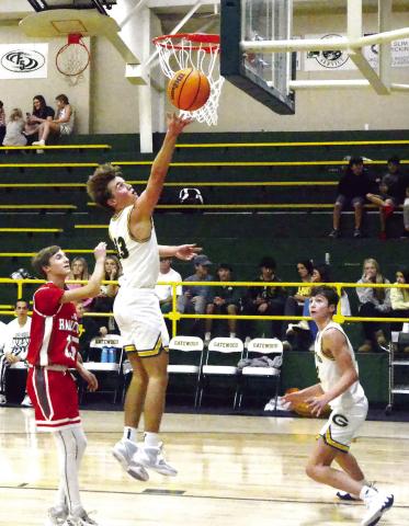 Junior Kaden Keiser (13) has enjoyed a good start to his season with the Gators, as has sophomore and team-leading scorer Matt Allen (right)