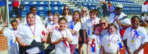 Student-athletes from each school within the Putnam County Charter School System wore matching color event t-shirts, with the team from Putnam County Elementary decked out in white.
