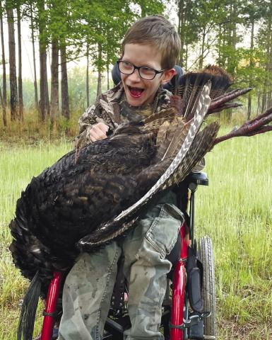 James Meeks with his turkey. JAMES PRESSLEY/Contributed