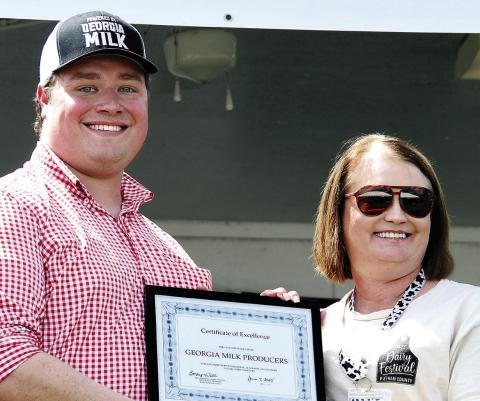 Executive Director Bryce Trotter received the 2025 Dairy Award on behalf of Georgia Milk Producers Inc. IAN TOCHER/Staff