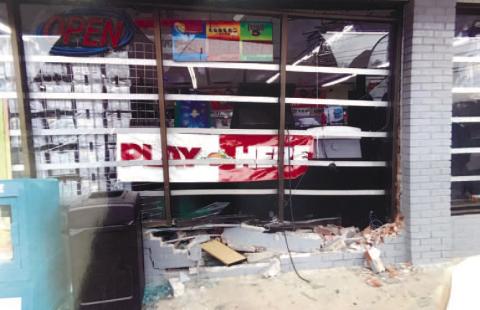 The Quick Pantry on Oak Street was damaged when an SUV crashed into it Sunday. CONTRIBUTED