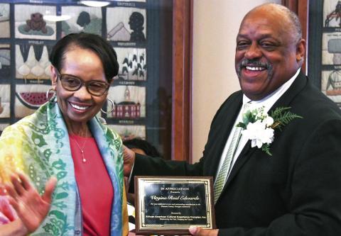 Eatonton native Virginia Reid Edwards received her AACEC award from Eatonton Mayor John Reid, signifying her role as one of the first Black women to be hired as a telephone operator in 1965 by Southern Bell in Atlanta. IAN TOCHER/Staff