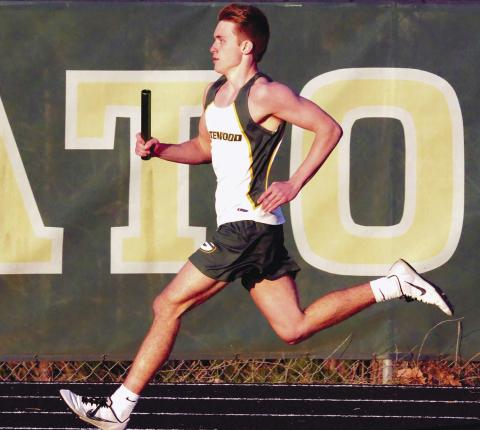 Kaden Keiser competes in one of the relay heat races for the Gators. IAN TOCHER/Staff