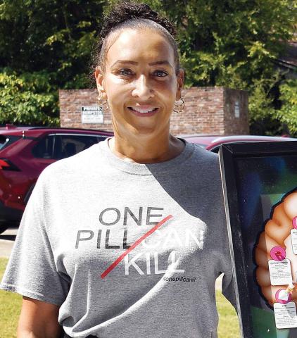 Wanda Wiggins, a community outreach specialist with the U.S. Drug Enforcement Administration, was in Eatonton on Saturday warning of the deadly dangers of fentanyl-laced drugs. IAN TOCHER/Staff