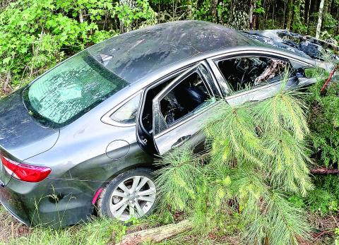 Seven people were fortunate to all escape injury in this crashed car early this month on Hogan Industrial Boulevard. LYNN HOBBS/ Staff