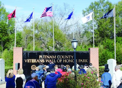 Originally designed by Bob Landau and dedicated to Veterans Day 2014, the wall anchors the 15,500-square-foot Putnam County Veterans Wall of Honor Park, a little west of downtown Eatonton alongside West Marion Street. (IAN TOCHER/Staff)