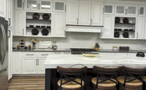 A more modern design of a kitchen is on display as you enter the doors of Cabinet Resources.