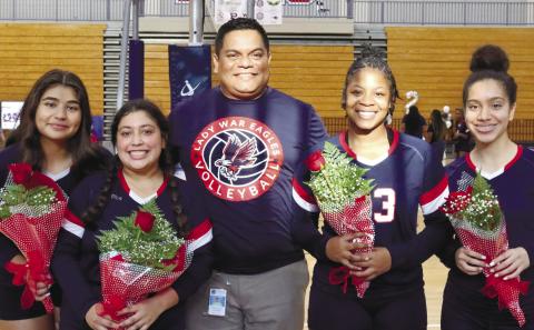 Seniors with Coach Aguirre, from left: Leslye Arriola, Angelica Alexander, Coach Aguirre, Tytianna Little, and Priscilla Sepulveda.