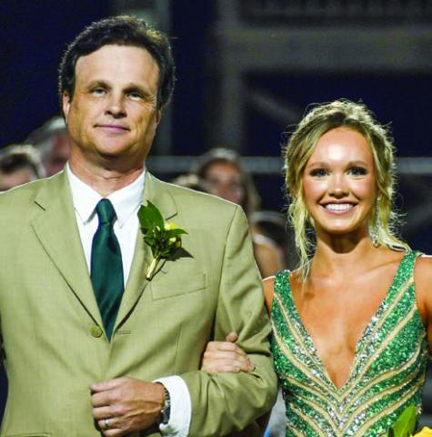 Homecoming Queen Presley Elizabeth Moss with her father Jay Moss. IAN TOCHER/Staff