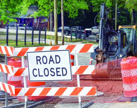 In a photograph from May 12, the Sunset Bar &amp; Grill sits tucked away in the trees shortly after construction got underway on downtown Eatonton’s East Marion Street. IAN TOCHER/Staff