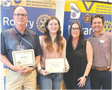 Mark Adams, Samantha Spisak, Ashley Spisak, and Rotarian Dr. Tyler Franks pose together. CONTRIBUTED