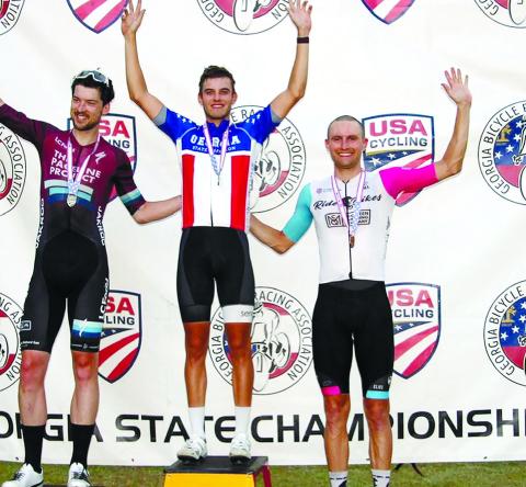 Senoia’s Caleb Landgrebe, winner of the criterium race in the Georgia State Championships last Saturday in Eatonton, stands between second-place finisher Jos Chalmers (left) and third-place Forrest Howard. CALEB LANDGREBE/Photo courtesy Facebook