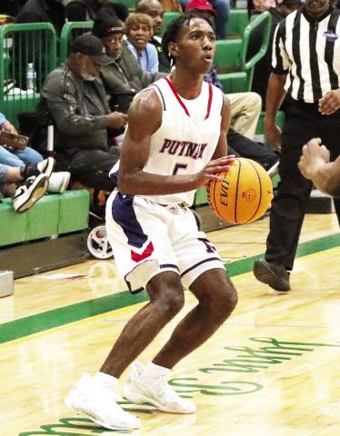 Putnam County senior guard Jaylin Harper (5) will play a key role as the team’s leader this year. LANCE McCURLEY/Staff
