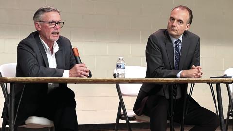 Putnam County District 2 Commissioner Daniel Brown (left) and challenger Richard Garrett spoke before interested voters last Thursday at the Butler-Baker school in Eatonton. A follow-up faceoff is scheduled for 6:30 p.m. this Thursday at The Plaza Arts Center. IAN TOCHER/Staff