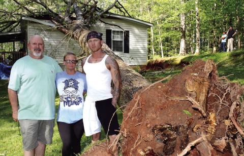 The Johnson family are lucky to be alive after escaping their home after a tree fell through the roof. (Photo/CONTRIBUTED)
