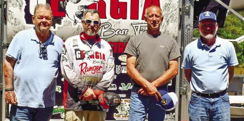 Organizers of the first Masonic Bass Tournament, left to right, past Master and Junior Deacon of Lodge No. 4 Michael Cumbie, GBT owner Michael Tarrer, Senior Steward of Lodge No. 4 Greg Smith, and Worship Master of Lodge No. 4, Michael Gailey. LENA HENSLEY/Staff