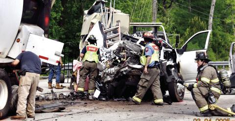Three men died after the pickup truck they were in crashed into the left rear of a tractor-trailer stopped for a traffic light on Hwy. 441 at Twin Bridges Road in Putnam County. IAN TOCHER/Staff