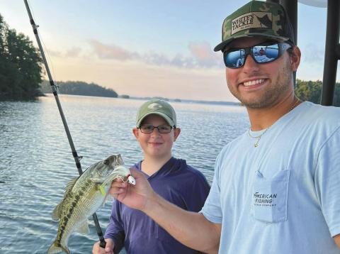 Beau and Ryan with a spotted bass.