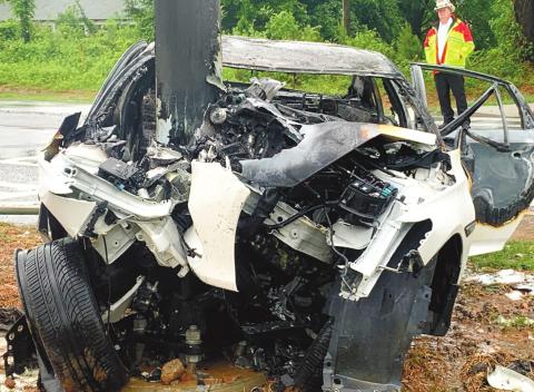 An Eatonton man died when his car crashed into the traffic light pole on Highway 44 at Scott Road and burst into flames. Passersby pulled the man out of the car before it burned. CONTRIBUTED/PCSO