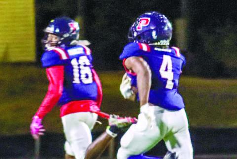 DJ Bland (4) takes a 77-yard jet sweep to the house, which was Putnam’s final score of the lop-sided 44-0 victory. LANCE McCURLEY/Staff
