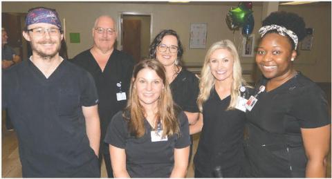 New PGH Director of Therapy Services Jana Weems (seated) will be supported by (l-r): physical therapist Ryan Faircloth, occupational therapy assistant Tim Belkins, office manager D.J. Holder, speech-language pathologist Brooke McMillen and physical therapy assistant Tequilla Reid. IAN TOCHER/Staff