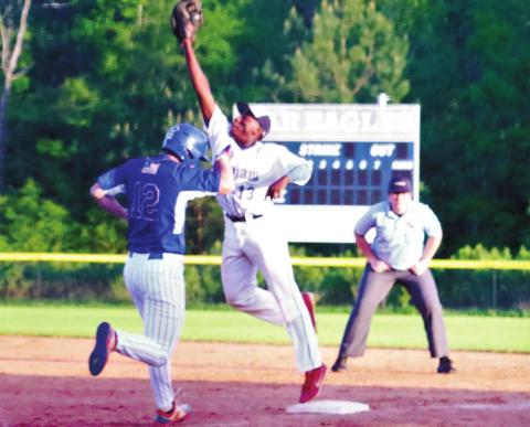 B.J. Ruff catches the ball for an out at first base. KIM CASH/Staff