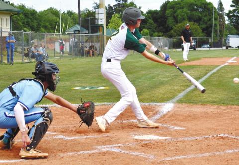 Gavin Fried takes a swing at the Piedmont pitcher’s slider. T. MICHAEL STONE/Staff