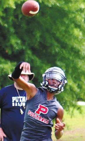Jamarion Robertson takes some snaps during a 7-on-7 scrimmage earlier this month. ARELLA CASH/Staff