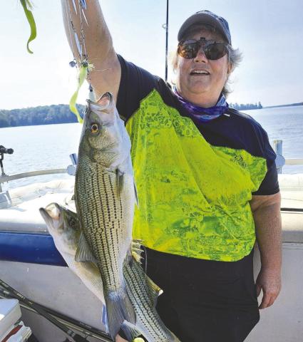 Lake Oconee Striper Club VP Darcy Flynn with a double on a mini-Mack rig. CONTRIUBTED