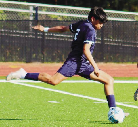 Putnam County’s Bryan Canales (2) takes a shot on goal. ARELLA CASH/Staff