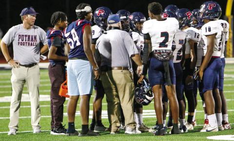 The War Eagles huddle during a timeout in a game earlier this season against Greene County. (LANCE MCCURLEY/Staff)