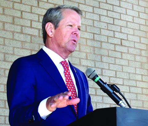 Georgia Gov. Brian Kemp speaks on the sacrifice of veterans and their need for care. BAILEY BALLARD/Staff