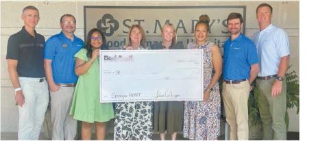 Employees of St. Mary's Good Samaritan Hospital in Greensboro accept a $100,000 contribution from BankSouth through the Georgia HEART Rural Hospital Tax Credit Program.