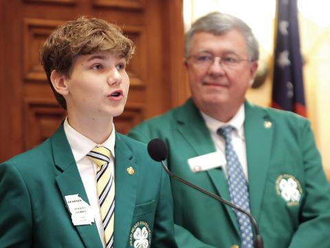 Putnam County 4-H member and Georgia 4-H State Board President Robert Thomas (left) addressed the Georgia Senate and Georgia House of Representatives last Thursday in Atlanta, during Georgia 4-H Day at the Capitol. The man beside him is Rep. Rick Jasperse, of Jasper, who worked as an extension agent before his election. CONTRIBUTED