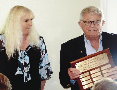 Smith Communications Business Manager Cassandra Fowler is announced as the 2022 Employee of the Year by President and CEO A. Mark Smith Sr. IAN TOCHER/Staff