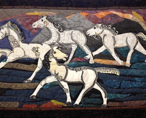 This quilt was made by Pat Gray and Lisa Albury as an interpretation of Steffen Thomas’ art. BAILEY MCCULLY/Staff