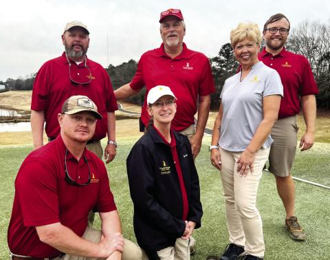 The staff at Uncle Remus Golf Course, including Garrett Few and Tiffany Mangham (front row) and (l-r) Jason Kimbrough, Pat Holder, Diane Carter, and course manager Michael Benton, are all determined to deliver a top-notch experience to golfers March 2 during the inaugural Leadership Putnam Class of 2023-24 Golf Tournament. IAN TOCHER/Staff
