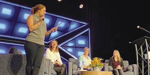 Georgia Writers Museum Executive Director Melissa Swindell (standing) was joined onstage by (l-r) Tara Rocker, Betty Liedtke and Kim Conrey in discussing the museum’s various roles within the local women’s community. EMME CLAUSE/Staff