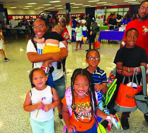 Happy families enjoyed the Reach 2 Teach Back-to-School Bash and Community Health Fair, held last Saturday at Putnam County Elementary School. CONTRIBUTED