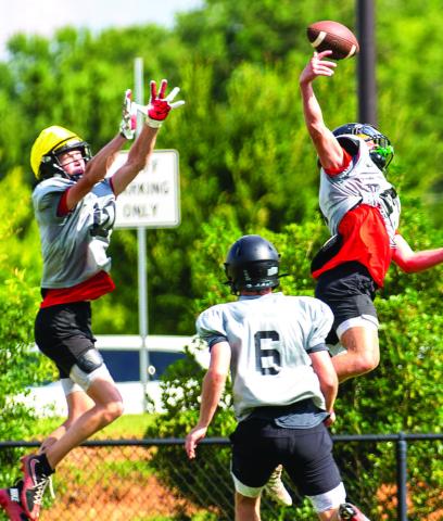 Wide receiver Cole Wesley makes an athletic catch at a recent practice. He’s expected to play a major role for Morgan County on offense this season. SKYLA MORRIS/Staff