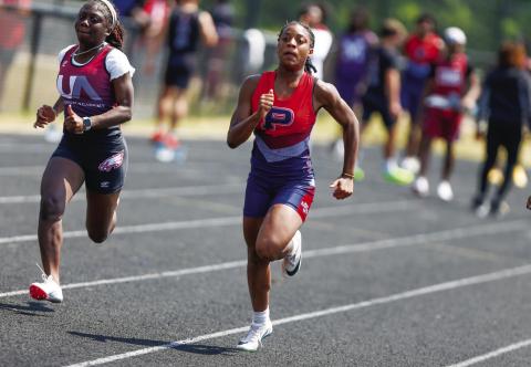 Putnam County freshman Aubree Butts competes in the 100-meter dash, where she finished second. LANCE McCURLEY/Staff