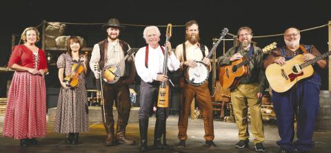 The great and talented musicians. From left to right: Donna Valvo, music director; Keiko Ishibashi, violin/fiddle; John Cooper, violin/mandolin/fiddle; Tom Shalin, instrumental director/fretless and electric bass; Tom Baker, banjo; Brian Smith, acoustic guitar; and Skip Taylor, acoustic guitar. Photos by LEIGH LOFGREN/Staff