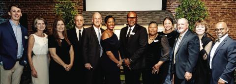 Members of the Habitat for Humanity of Putnam County Board of Directors and staff join Justice Verda Colvin (center) at last week’s Building Hope Gala, where the Lake Country community helped raise more than $100,000 for affordable housing. CONTRIBUTED