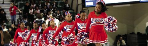 The Putnam County cheerleaders performed during halftime in the Centennial Center. TREY NORRIS/Staff