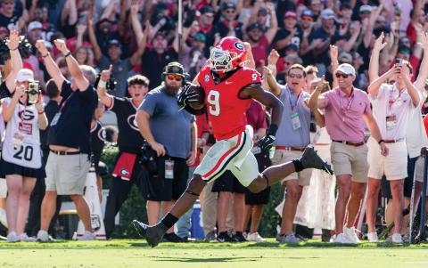 Georgia linebacker Chris Cole returns an Oklahoma fumble 85 yards for a touchdown. SKYLA MORRIS/Staff