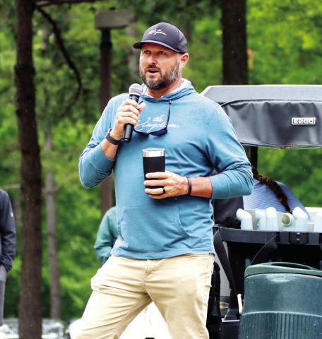 Former PGA golfer and Gatewood graduate Blake Adams shares a devotion before the start of the tournament.  (LANCE MCCURLEY/Staff)